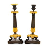 A Pair of Charles X Gilt and Patinated Bronze Candlesticks