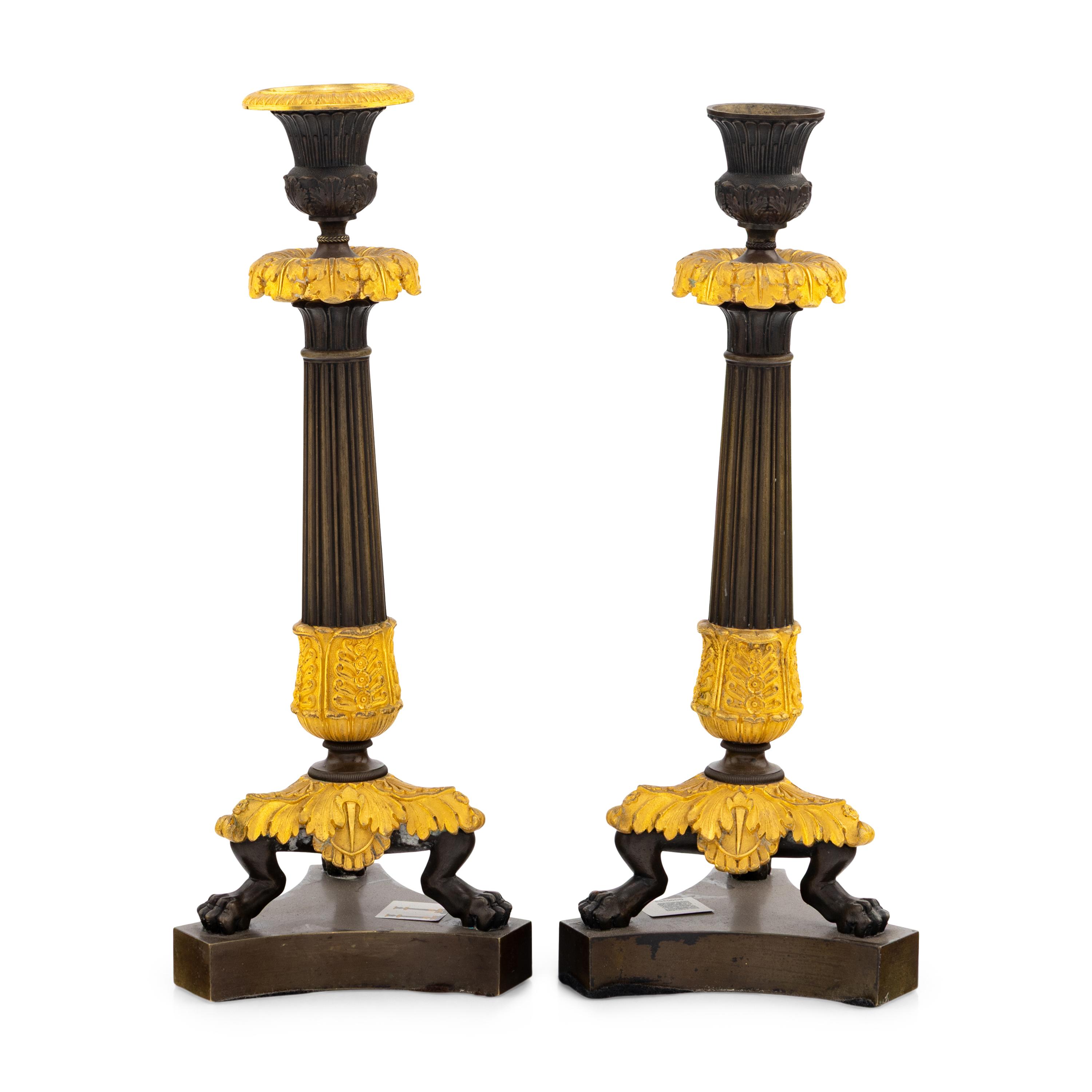 A Pair of Charles X Gilt and Patinated Bronze Candlesticks