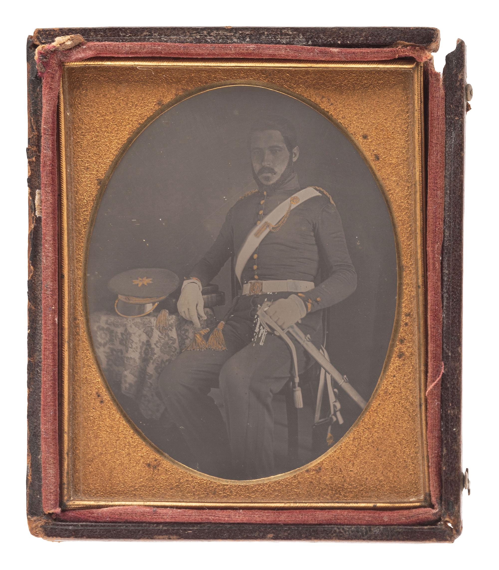 [EARLY PHOTOGRAPHY]. Quarter plate daguerreotype portrait of an English junior officer with sword.