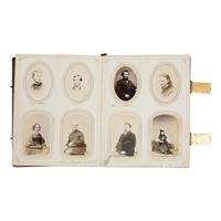[Civil War]. A group of Civil War-era CDV albums and post-war reunion badges.