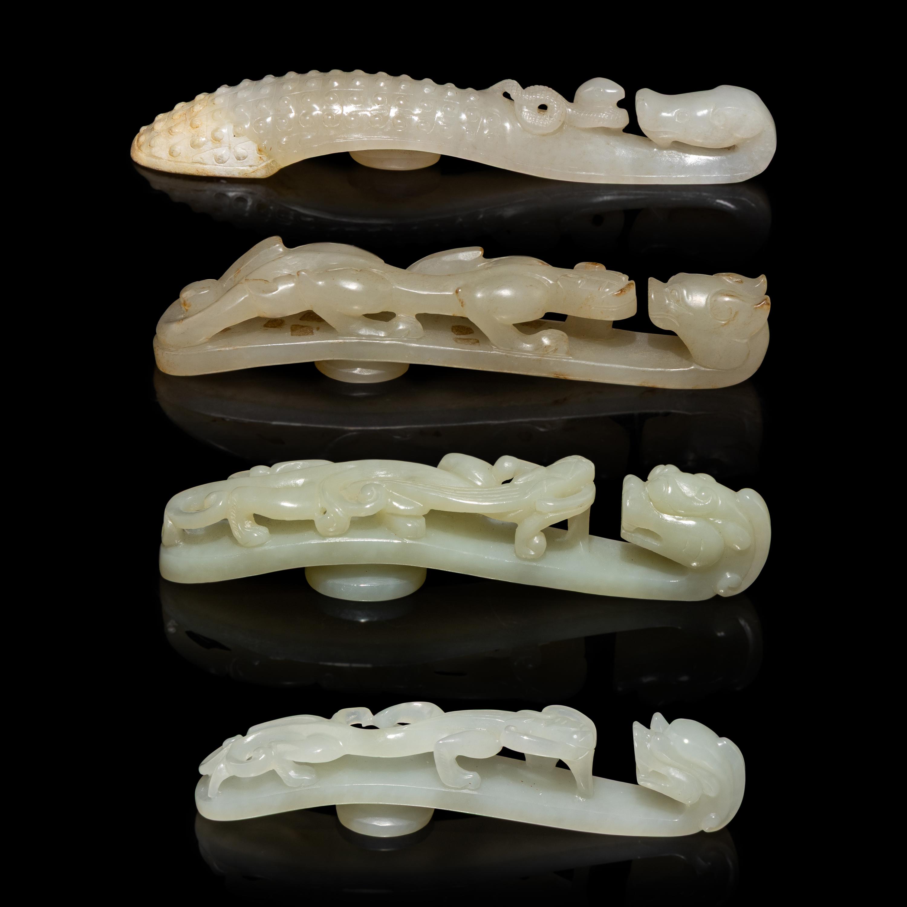 Four Chinese Pale Celadon Jade 'Dragon' Belt Hooks, Daigou — 青白玉龍鈎四枚