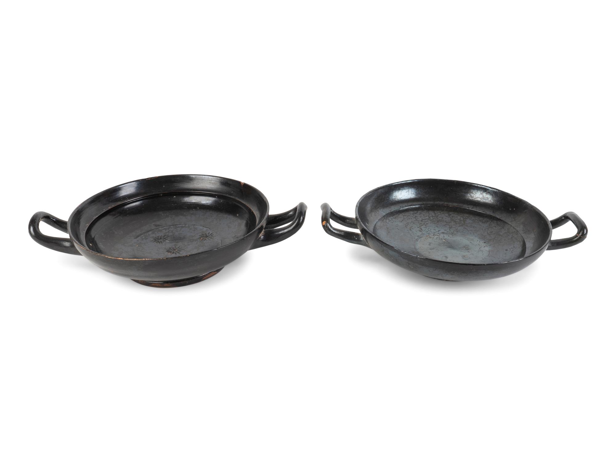 Two Greek Black-Glazed Stemless Kylikes