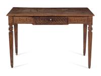 An Italian Carved Walnut Writing Desk