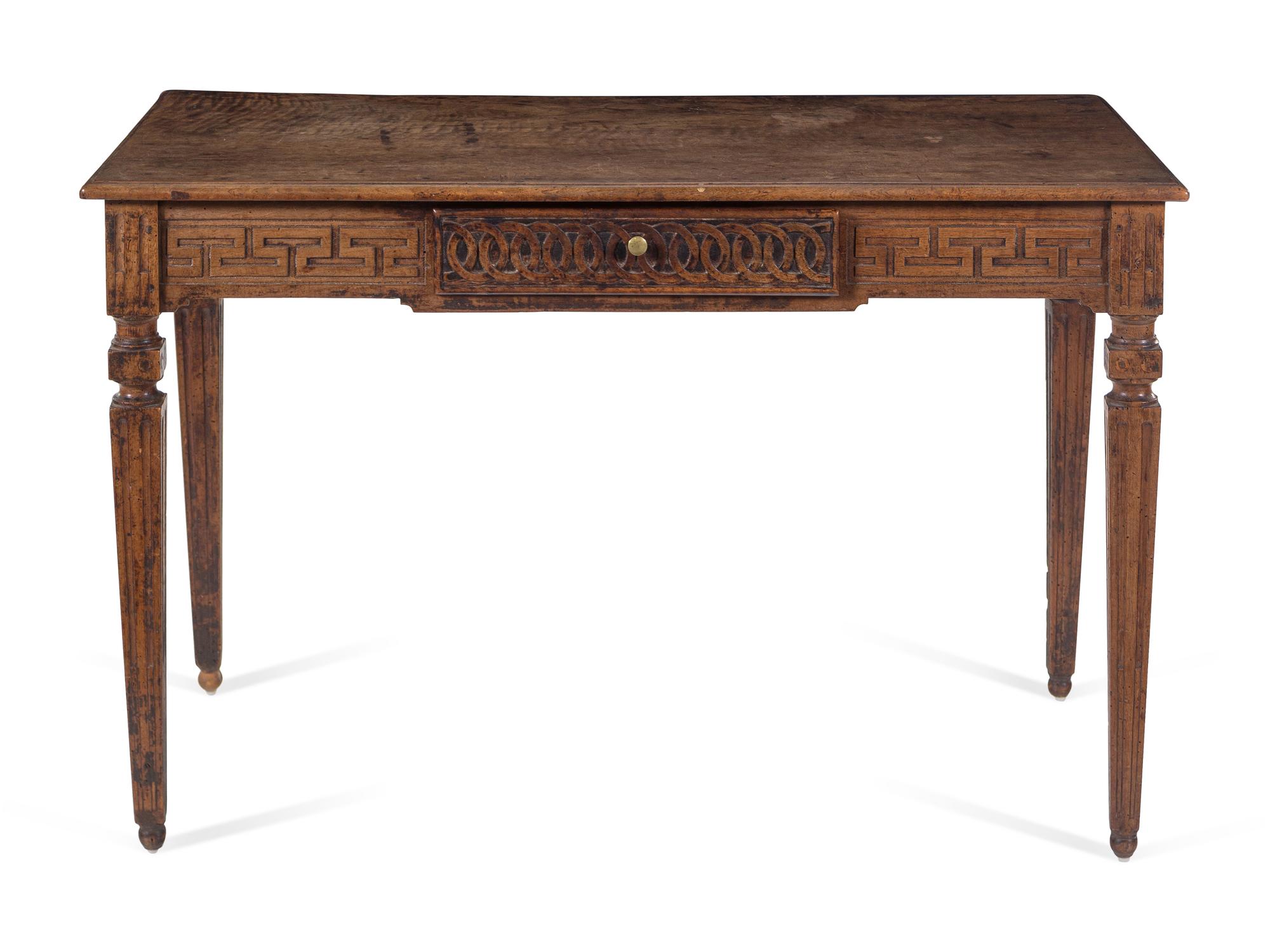 An Italian Carved Walnut Writing Desk