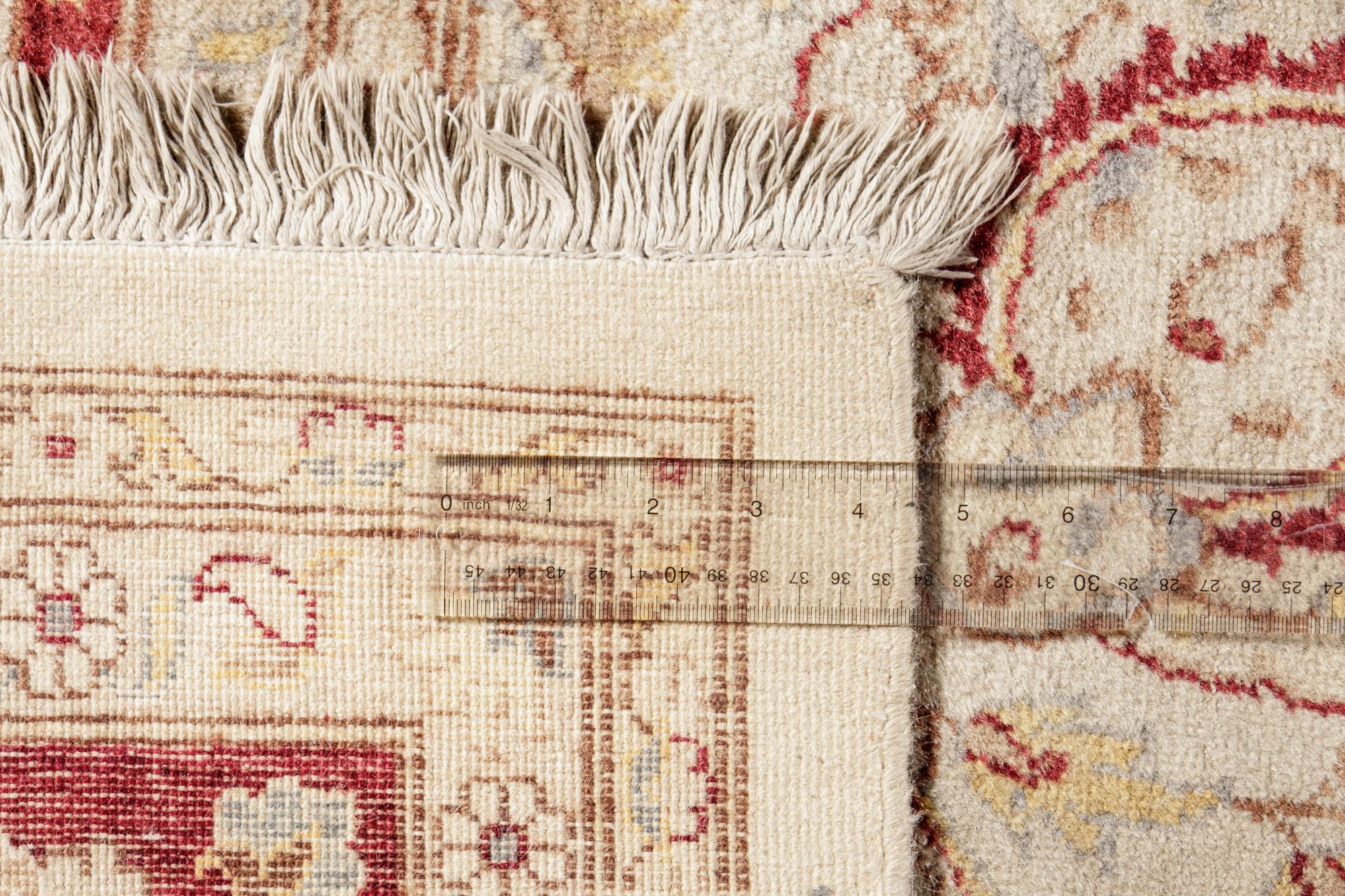 An Agra Style Wool Rug