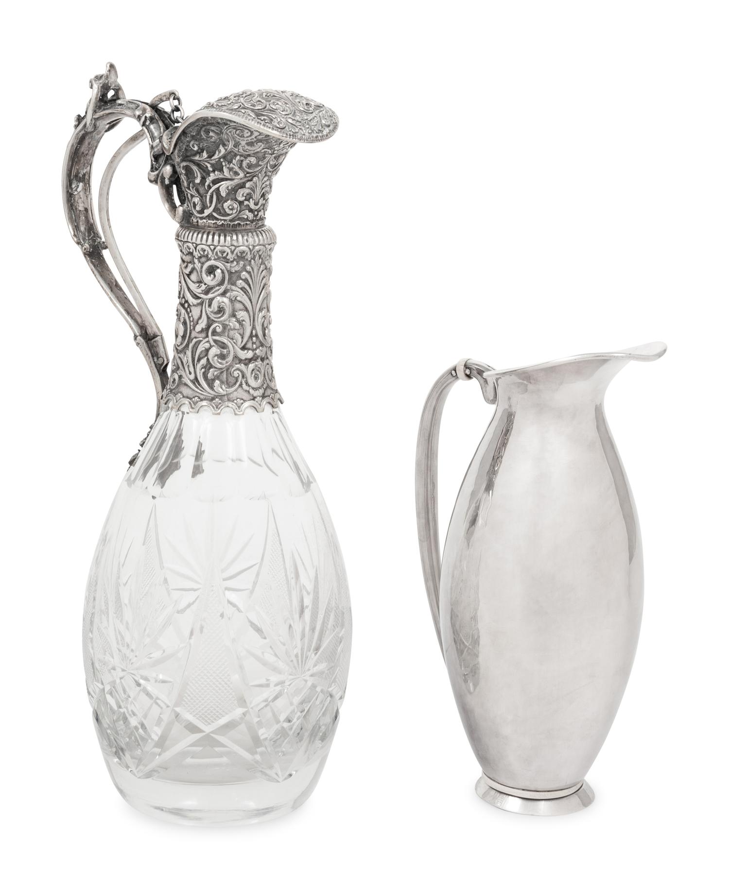 A Silver Mounted Cut Glass Claret Jug and a Danish Silver Pitcher