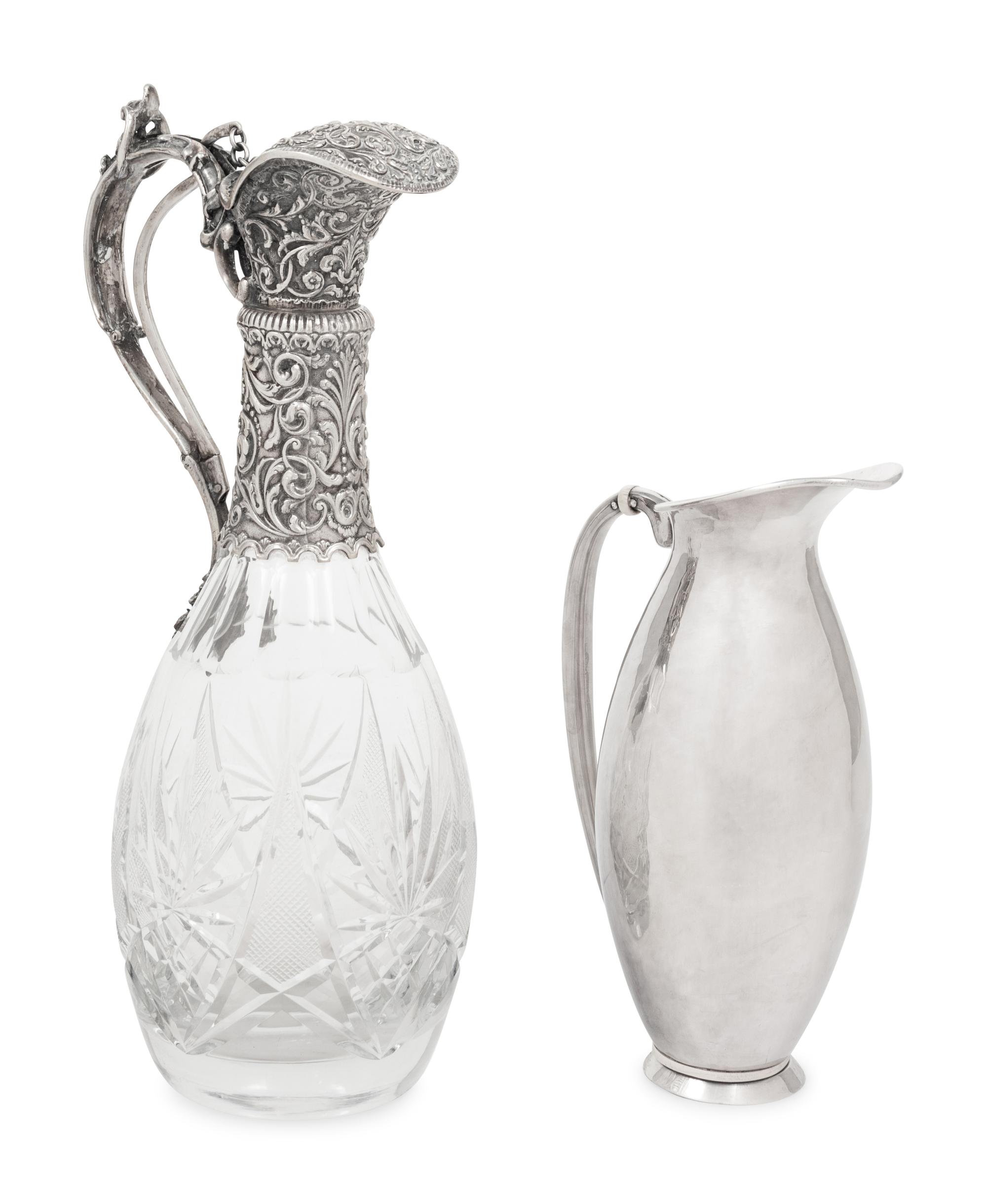 A Silver Mounted Cut Glass Claret Jug and a Danish Silver Pitcher