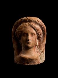 An Etruscan Terracotta Votive Head of a Woman