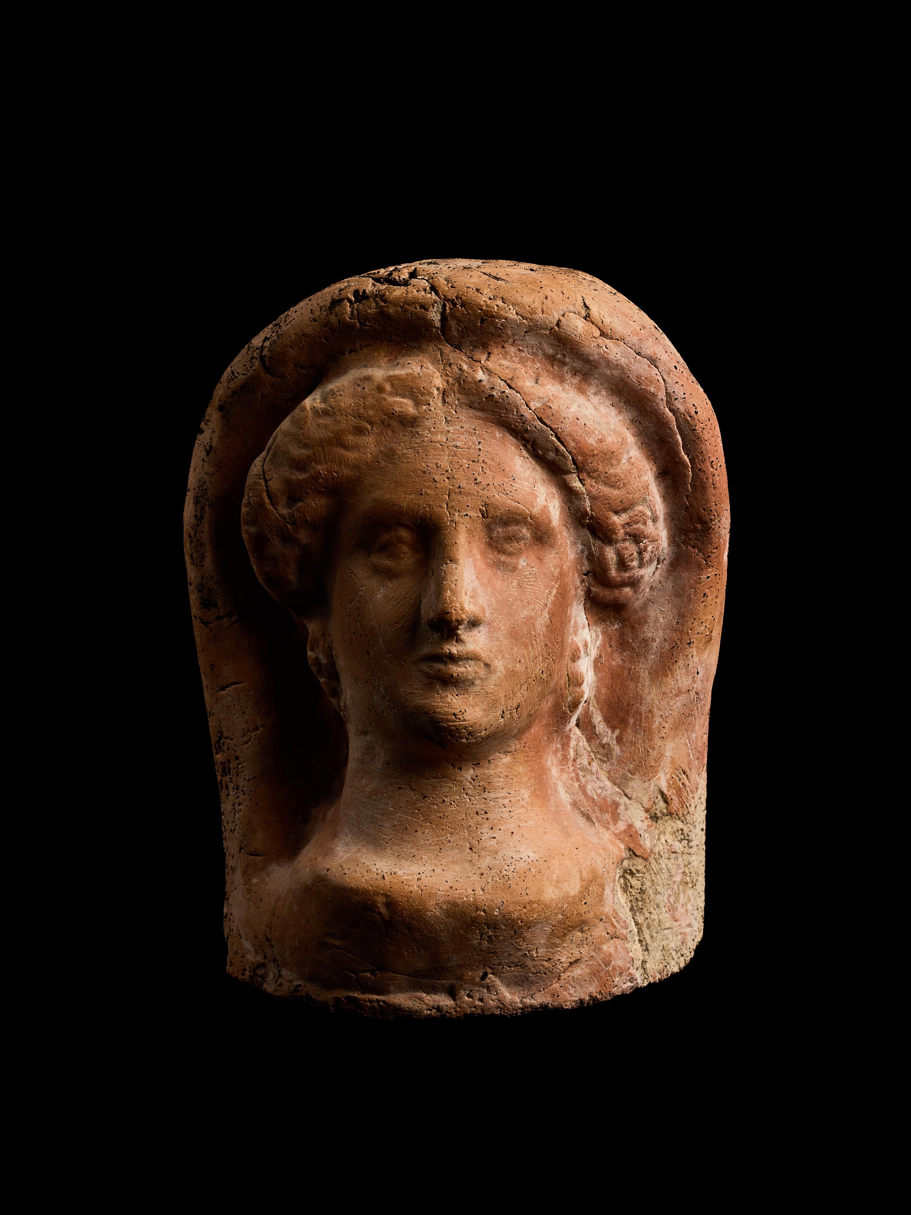 An Etruscan Terracotta Votive Head of a Woman
