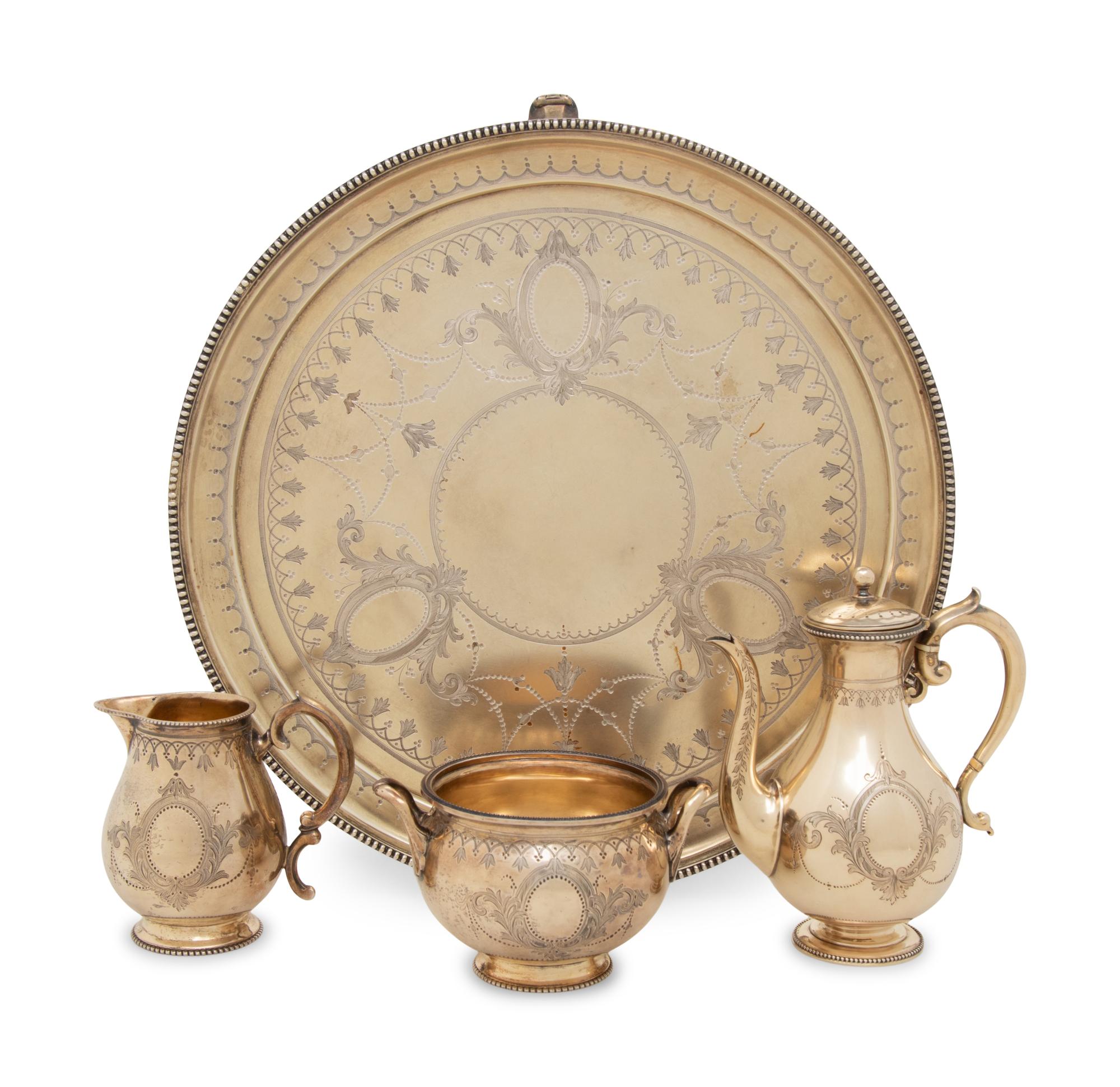 A Victorian Silver-Gilt Coffee Service