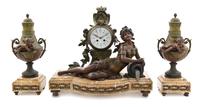 A French Cast Metal and Marble Three-Piece Clock Garniture, Silbin, Width of clock 22 inches.