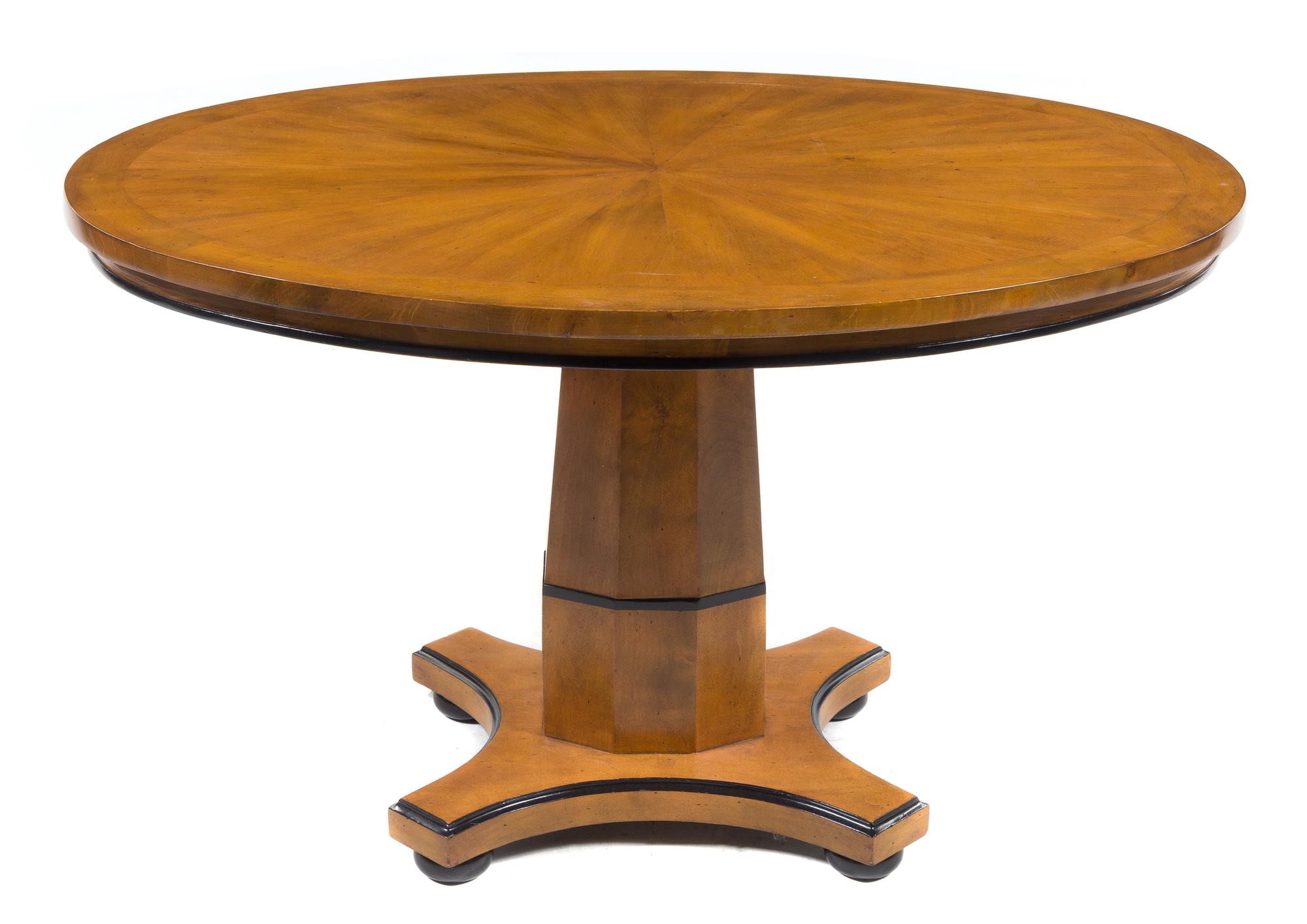 A Biedermeier Style Parcel Ebonized Center Table Height 30 1/2 x width 55 x depth 43 inches. — 20TH CENTURY