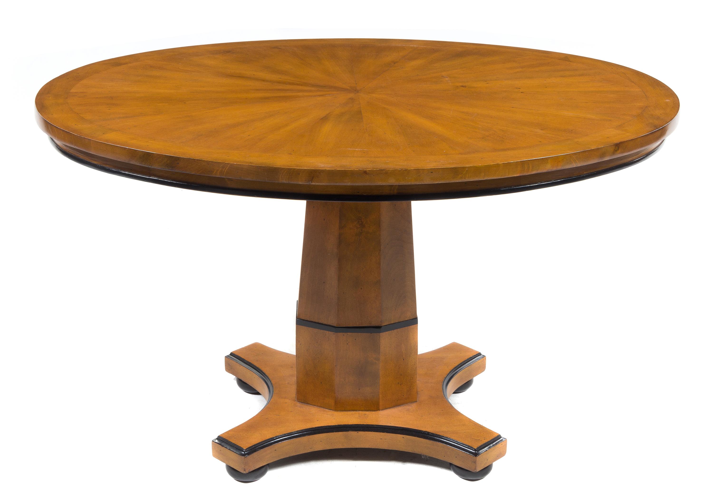 A Biedermeier Style Parcel Ebonized Center Table Height 30 1/2 x width 55 x depth 43 inches. — 20TH CENTURY