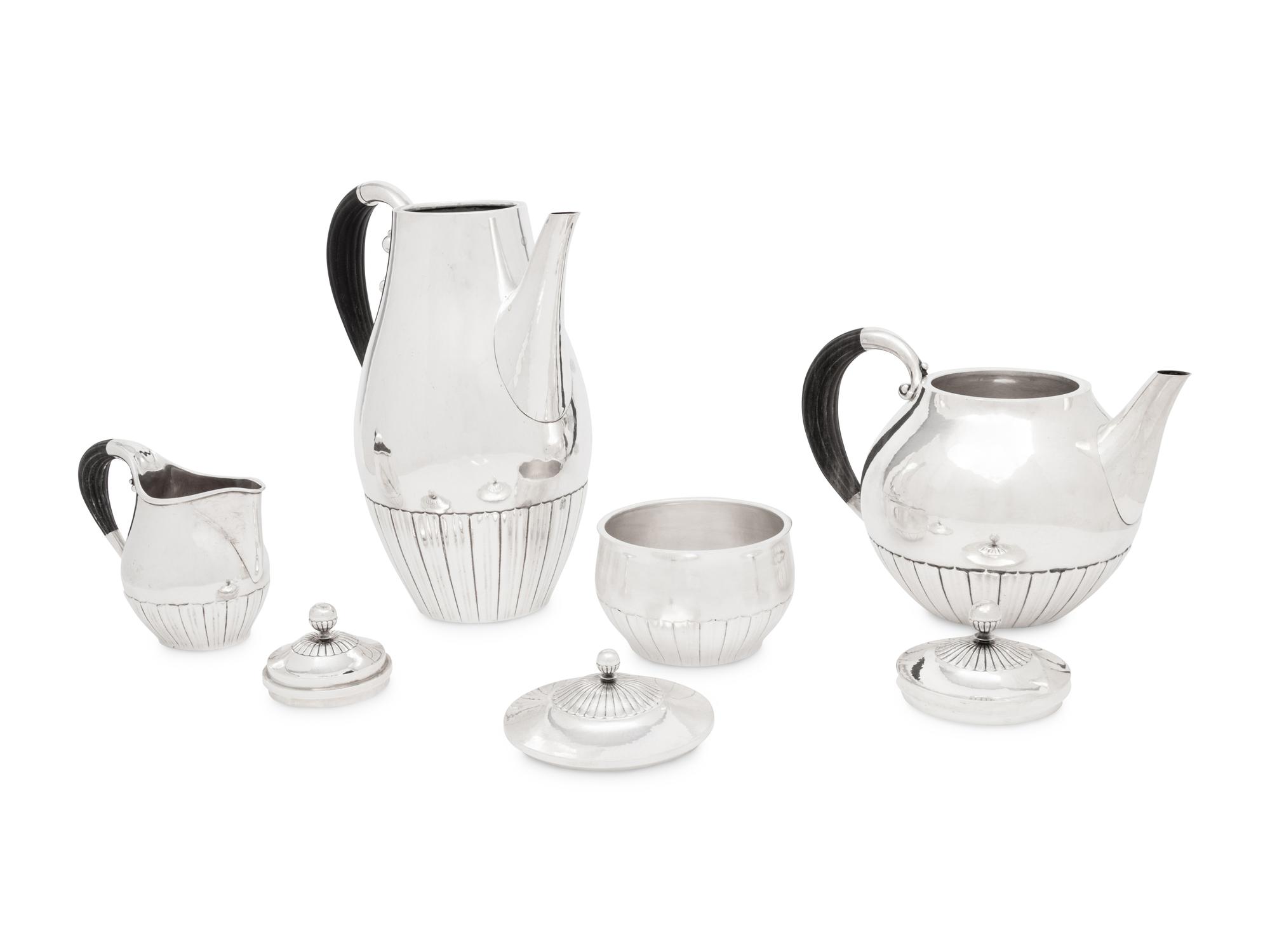 A Johan Rohde for Georg Jensen Cosmos Silver Four-Piece Tea Service