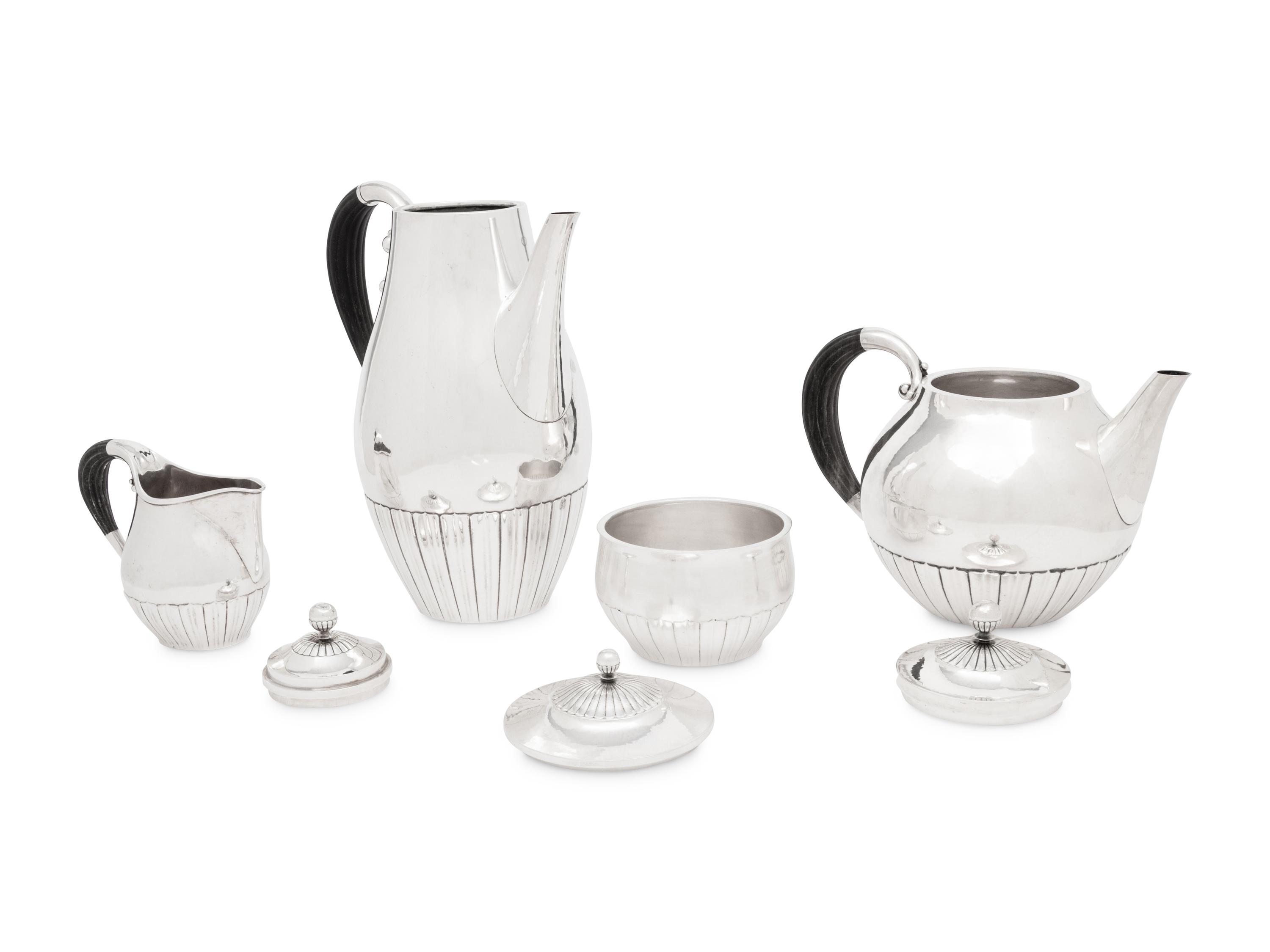 A Johan Rohde for Georg Jensen Cosmos Silver Four-Piece Tea Service