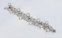 A Platinum, Cultured South Sea Pearl and Diamond Bracelet, Harry Winston, 66.00 dwts.