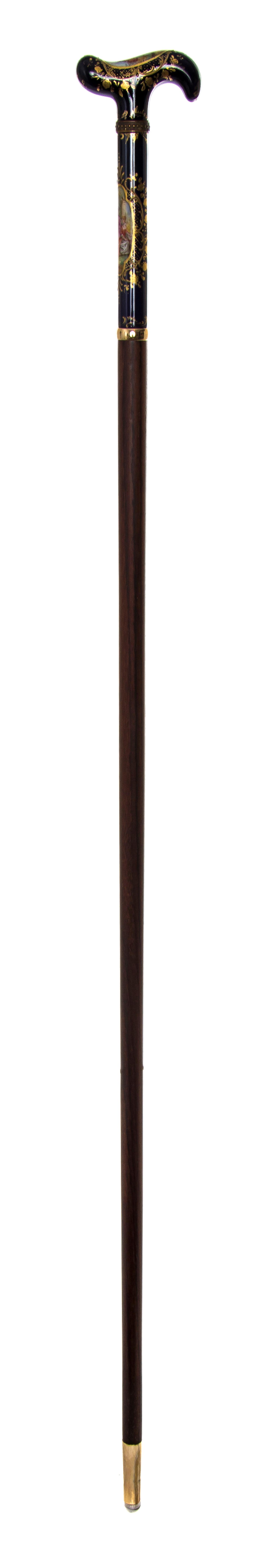 A Sevres Style Porcelain Handled Cane, Length of handle 6 x length overall 36 inches.