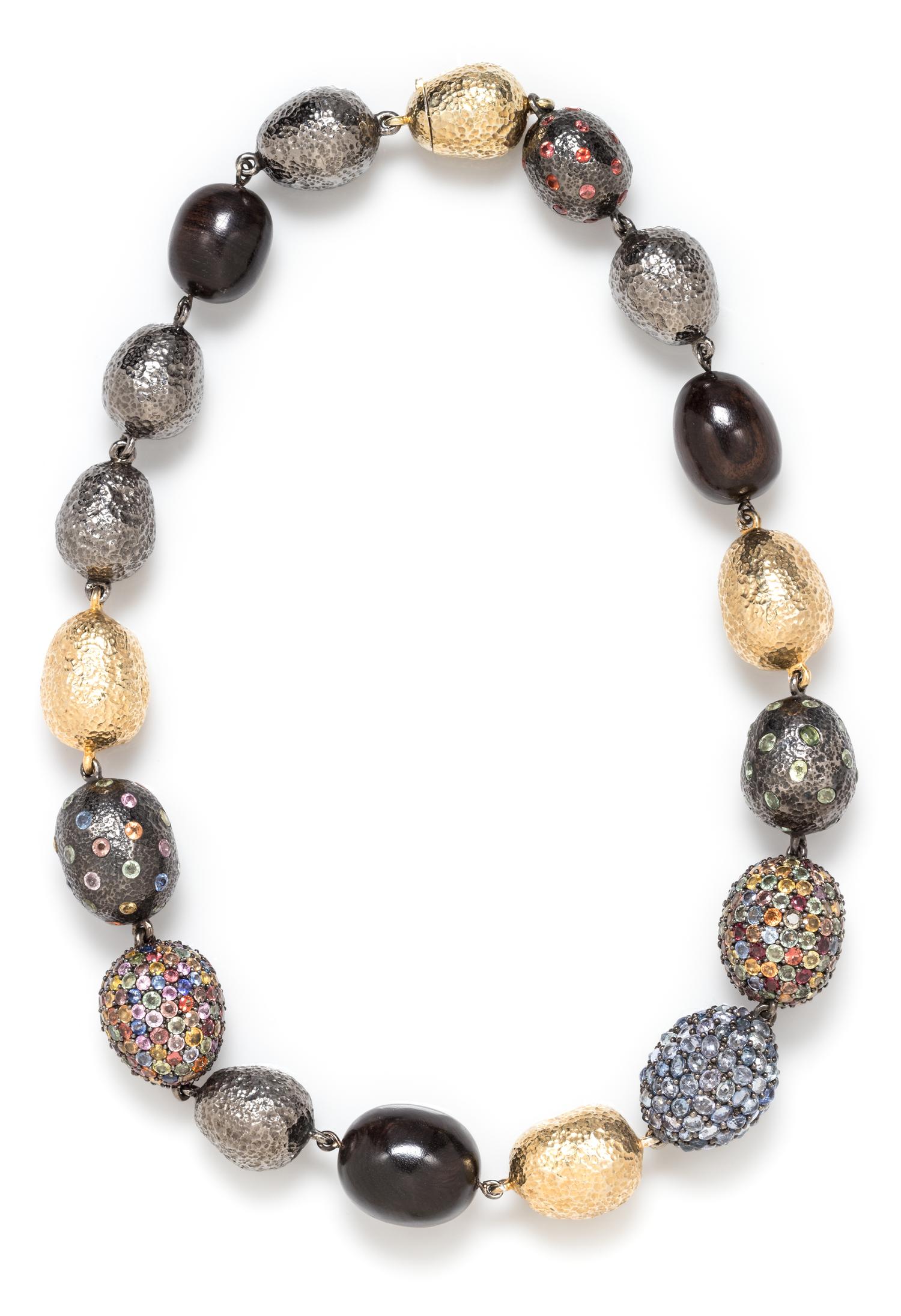 An Oxidized Silver, Gilt Silver, Wood and Multicolor Sapphire Necklace, 163.00 dwts.