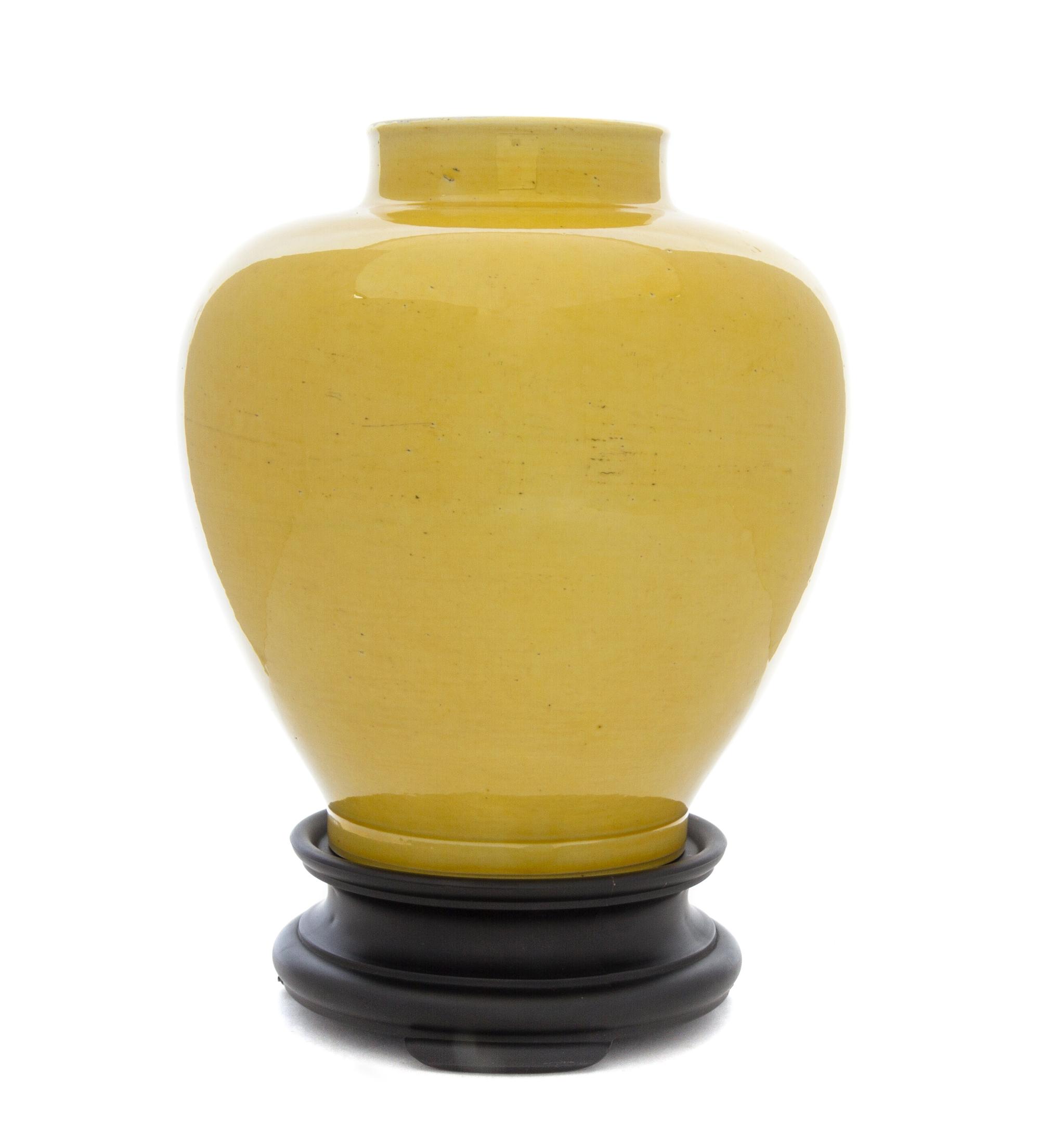 A Monochrome Yellow Glazed Porcelain Jar Height 9 inches.