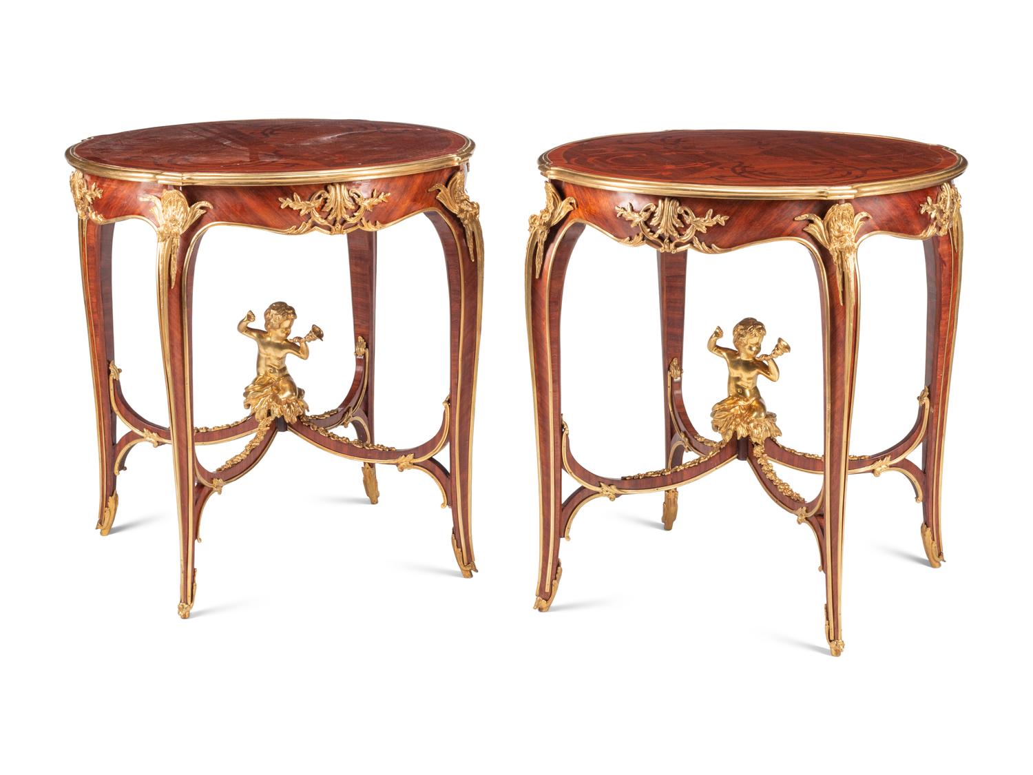 A Pair of Louis XV Style Gilt Bronze Mounted Marquetry and Mahogany Side Tables
