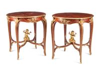 A Pair of Louis XV Style Gilt Bronze Mounted Marquetry and Mahogany Side Tables