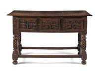 A Jacobean Style Carved Walnut Console Table