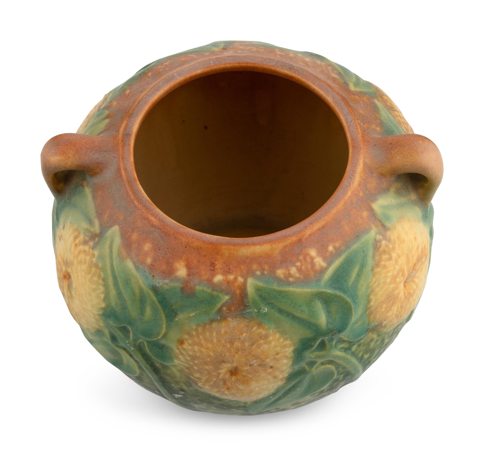 A Group of Seven Roseville Pottery Vases