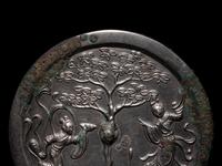 A Bronze 'Moon Palace' Mirror