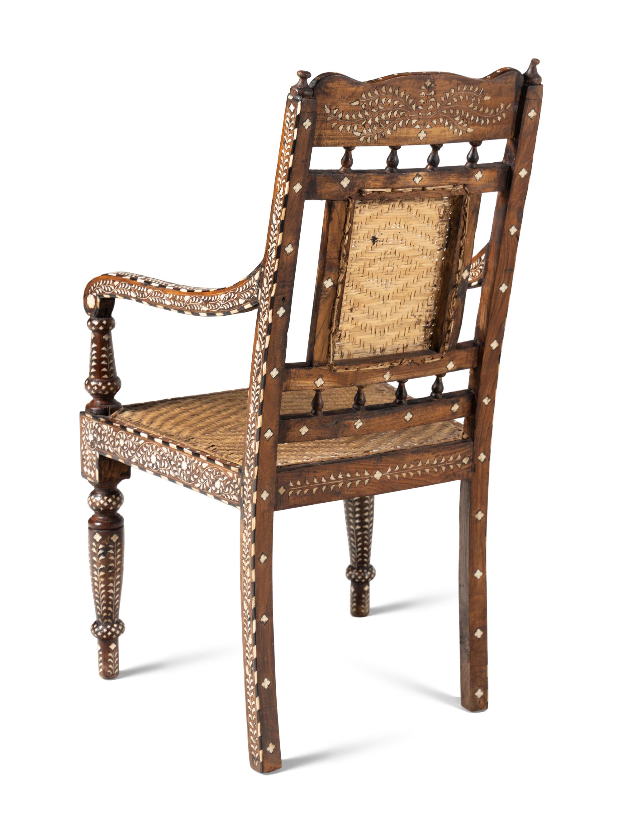 A Pair of Vizagapatam Style Bone Inlaid Hardwood Chairs