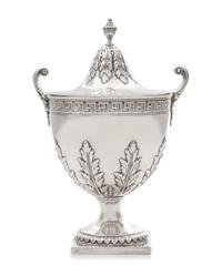 A George III Covered Sugar, Elizabeth Roker, London, 1775, the beaded urn form finial above the acanthus decorated lid, the body with b