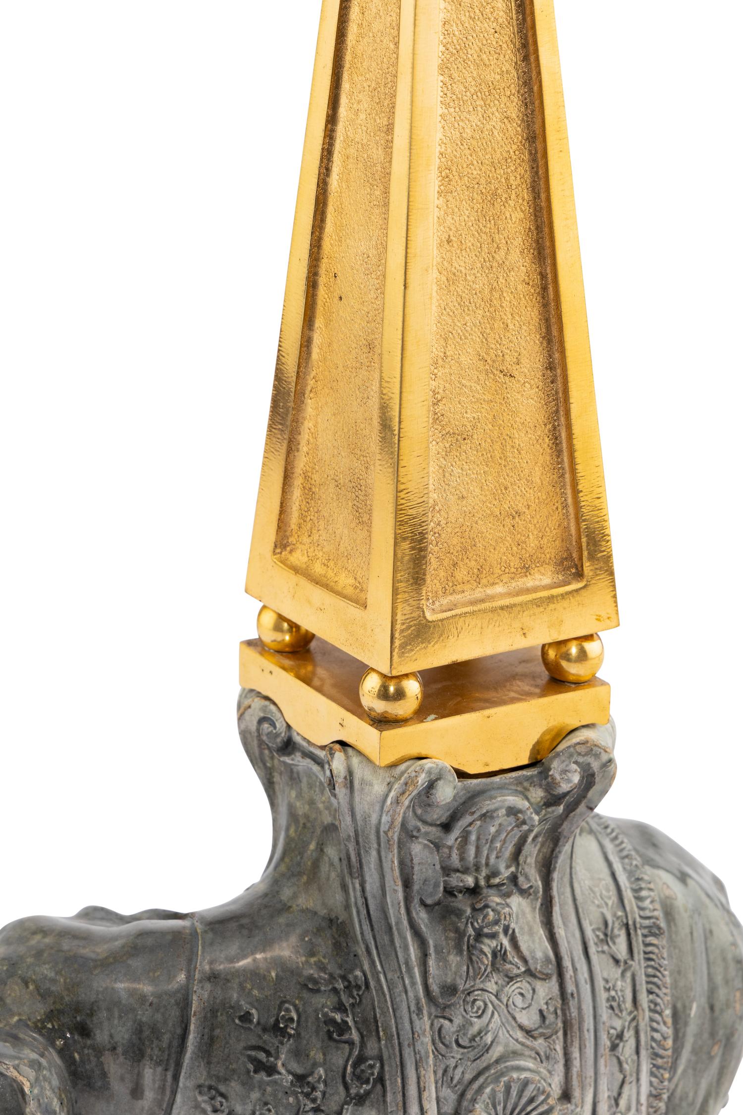 A Continental Gilt Bronze and Glazed Earthenware Elephant Obelisk