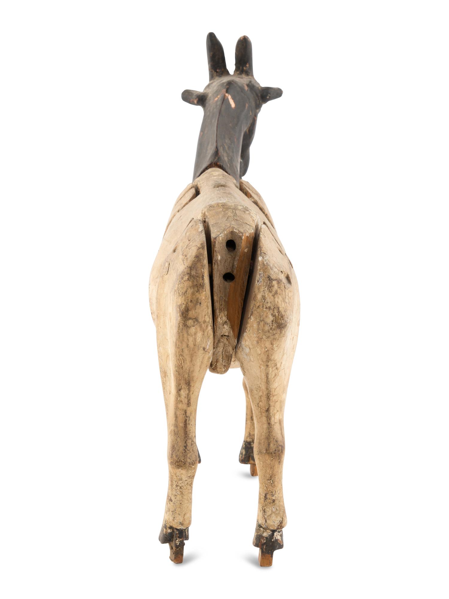 A Carved and Painted Wood Billy Goat Figure
