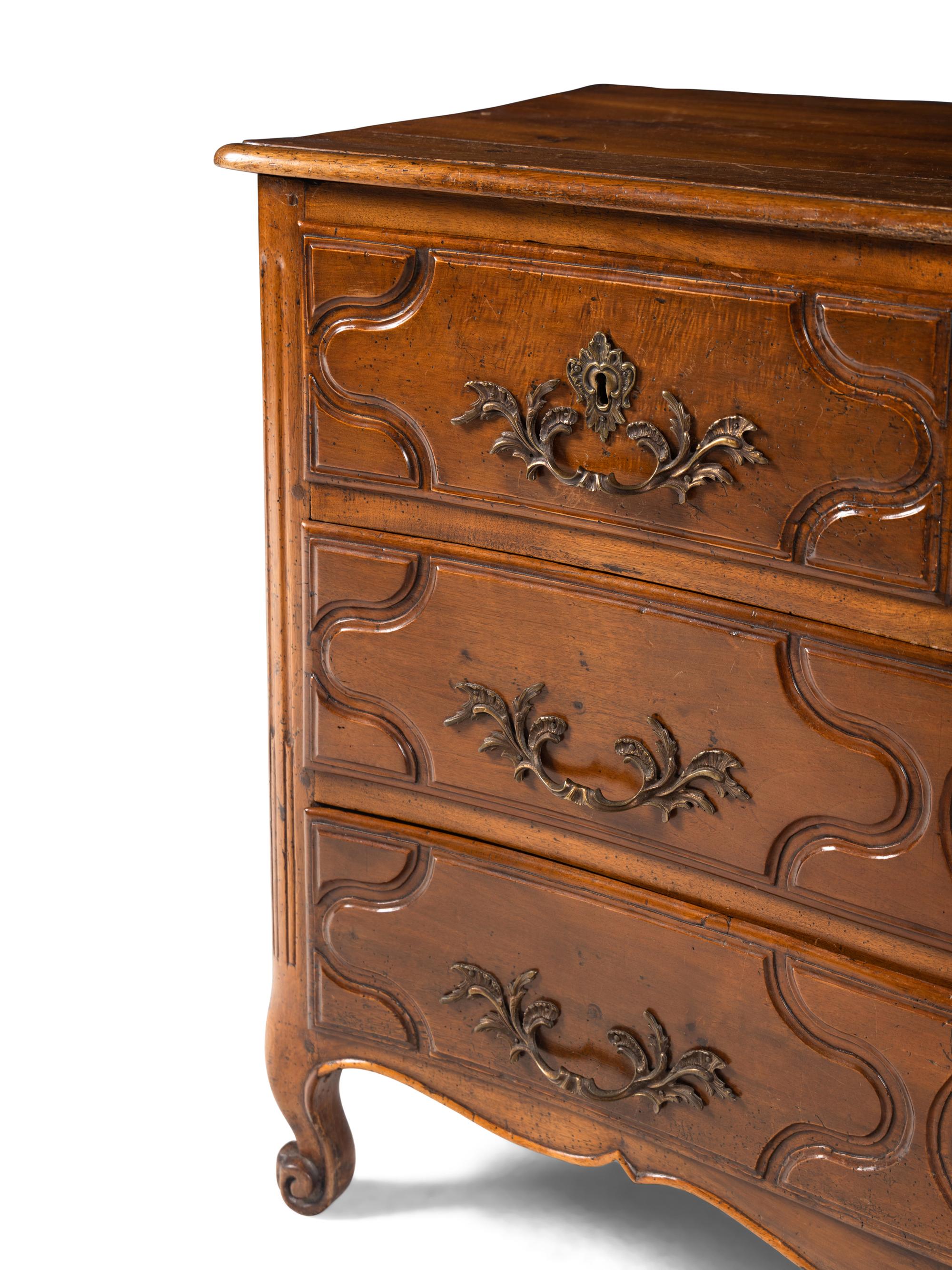 A Louis XV Provincial Walnut Commode