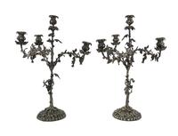 A Pair of Continental Silver-Plate Four-Light Candelabra Height 25 inches. — 19TH CENTURY