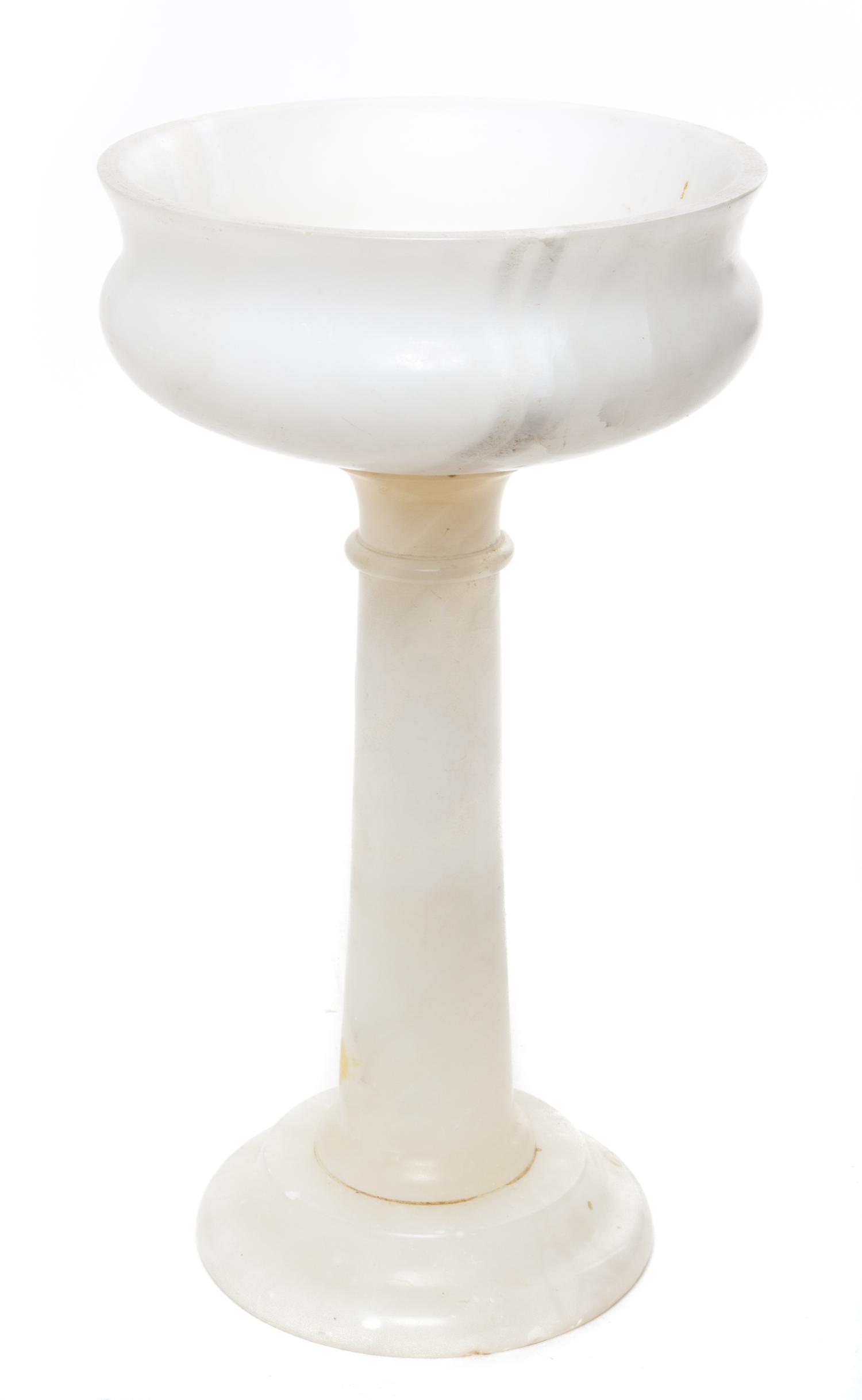 An Alabaster Centerpiece Bowl Height 12 7/8 inches.