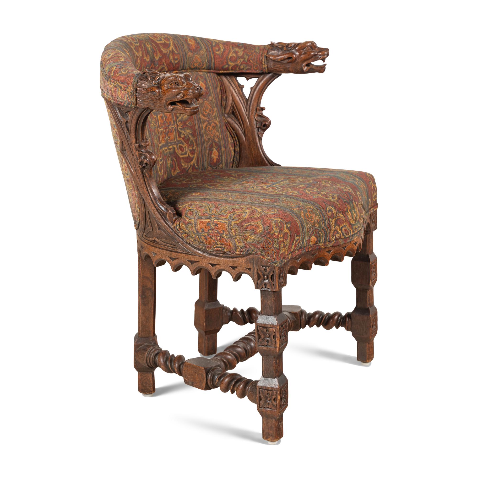 A French or Italian Gothic Revival Carved Oak Armchair