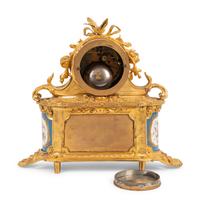 A French Gilt Bronze and Sèvres Style Porcelain Mantel Clock