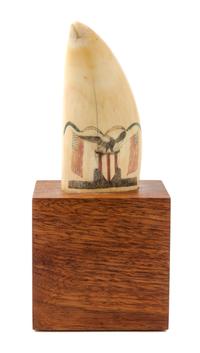An American Engraved and Colored Scrimshaw Whale Tooth Height 4 1/4 inches — EARLY 19TH CENTURY