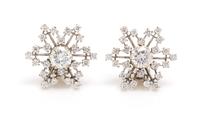 A Pair of 14 Karat White Gold Diamond Cluster Earclips, 4.80 dwts.