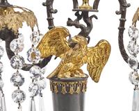 A Pair of George III Patinated and Gilt-Bronze Eagle-Decorated Two-Light Girandoles
