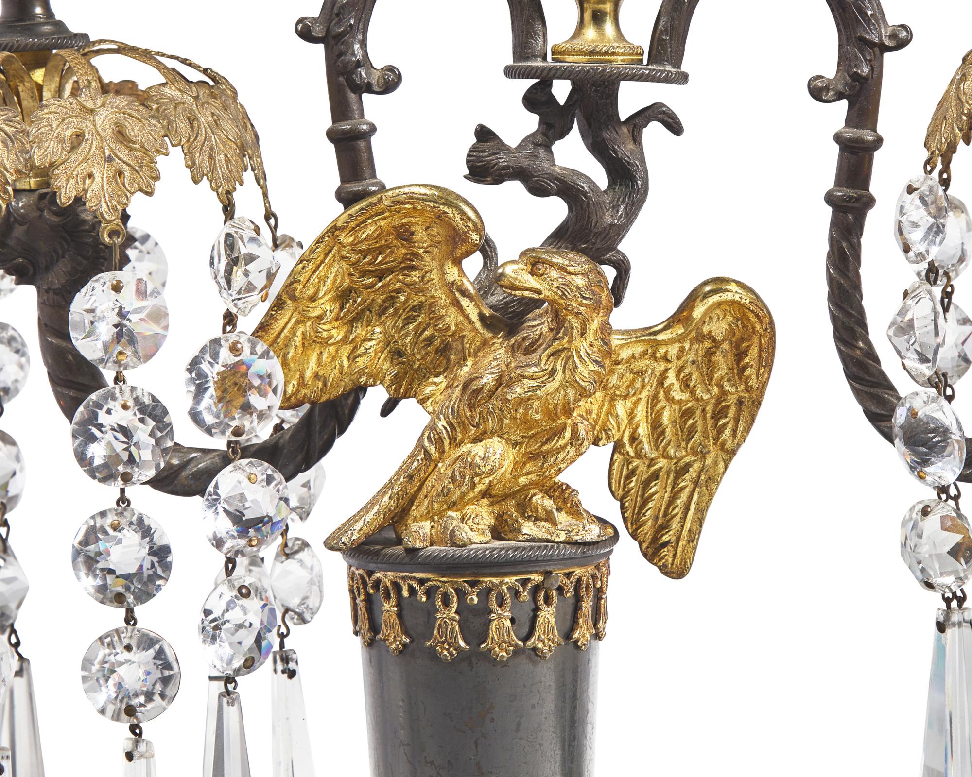 A Pair of George III Patinated and Gilt-Bronze Eagle-Decorated Two-Light Girandoles