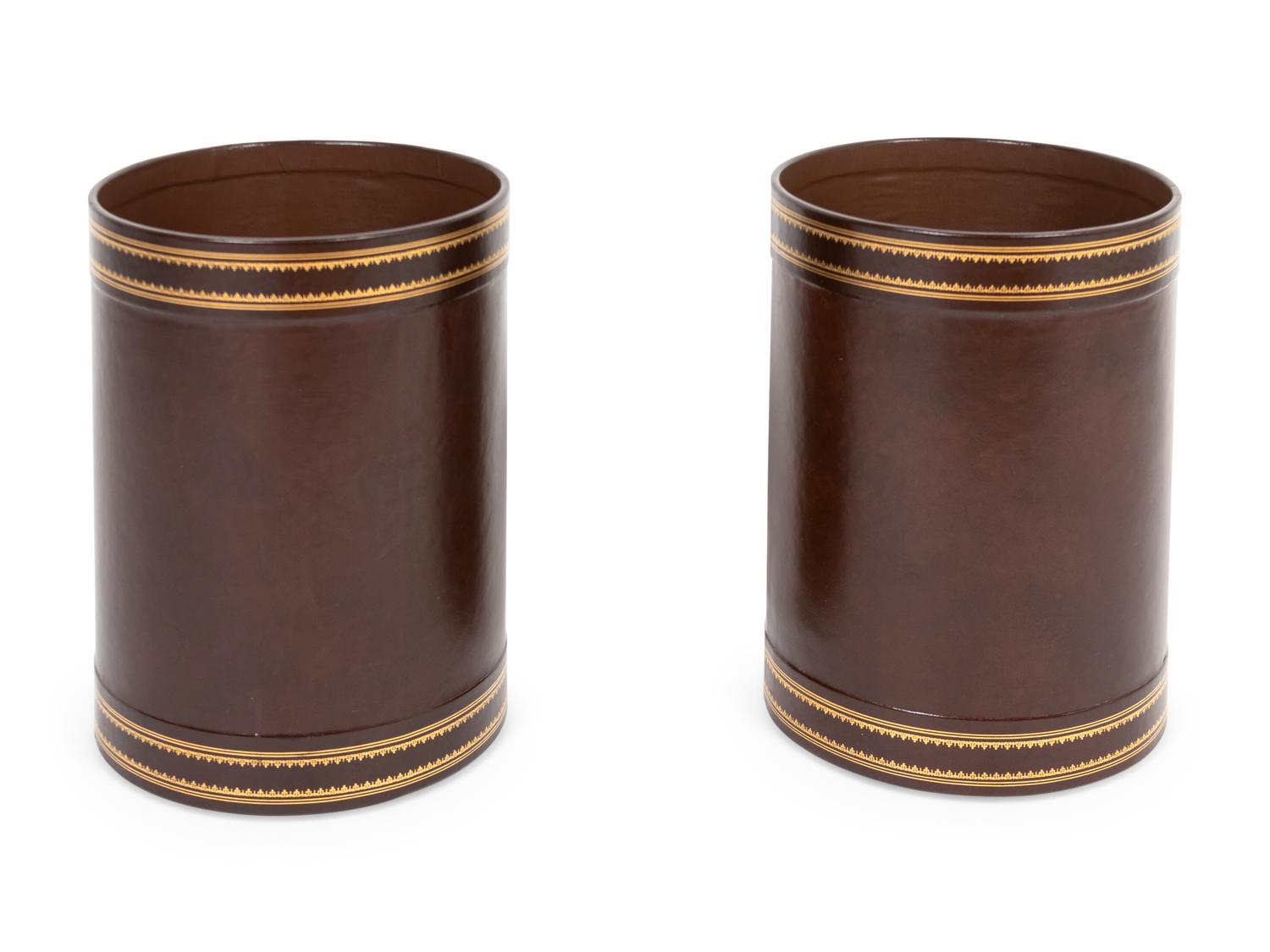 A Pair of Parcel-Gilt Leather Bins
