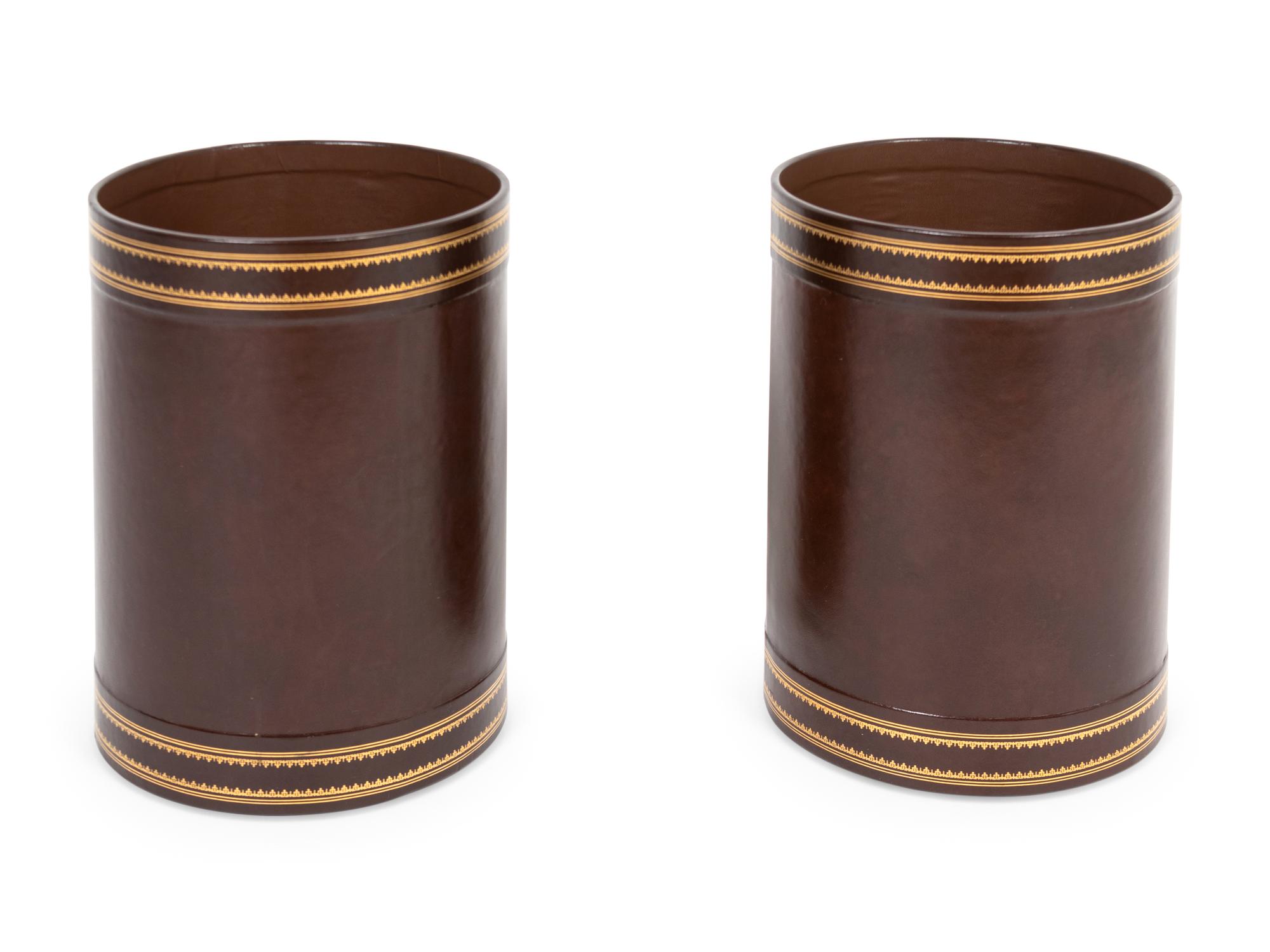 A Pair of Parcel-Gilt Leather Bins