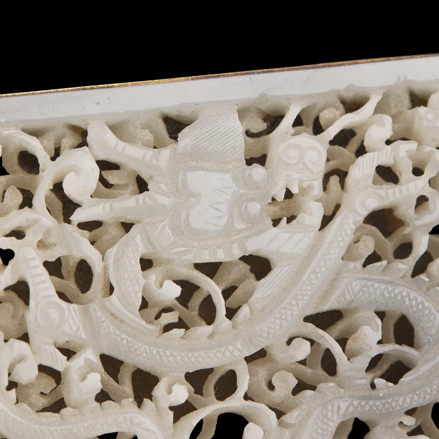 A Chinese Jade Inset Metal Mounted Buckle, Ming-Qing Dynasty 明-清 白玉穿花龍紋帶板