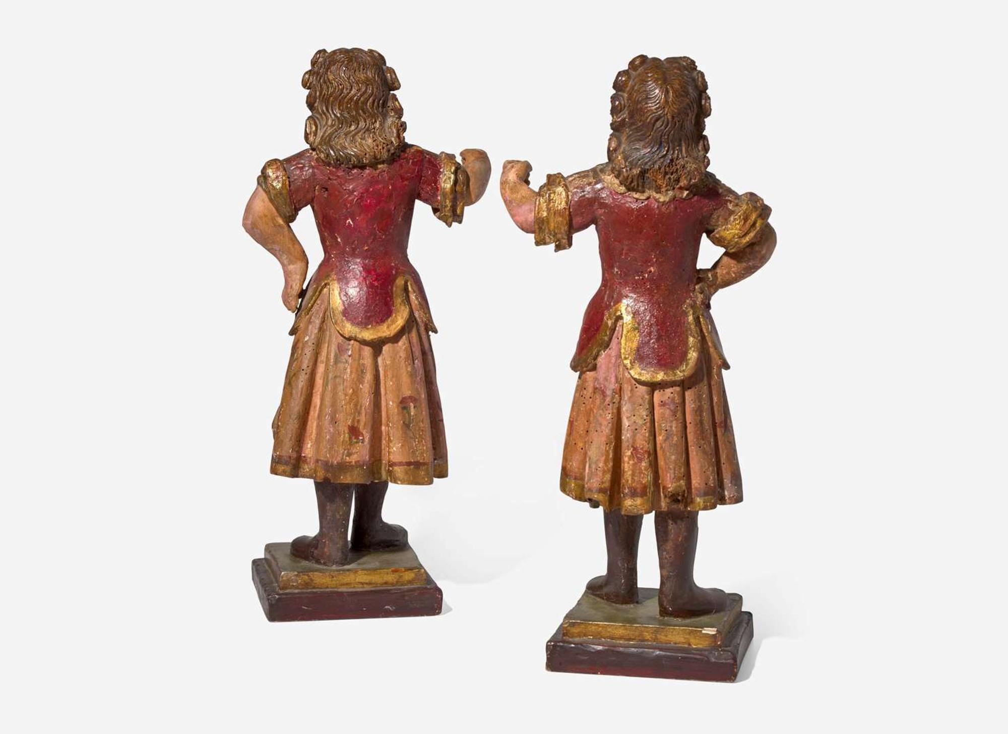 A small pair of Italian carved and polychromed wood figures, 18th century