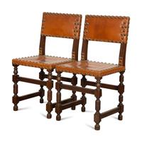 A Pair of Oak and Leather Side Chairs