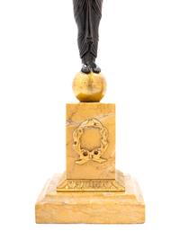 A Pair of French Egyptian Revival Bronze and Marble Candlesticks