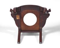 A Queen Anne Walnut Compass-Seat Open Arm Chair