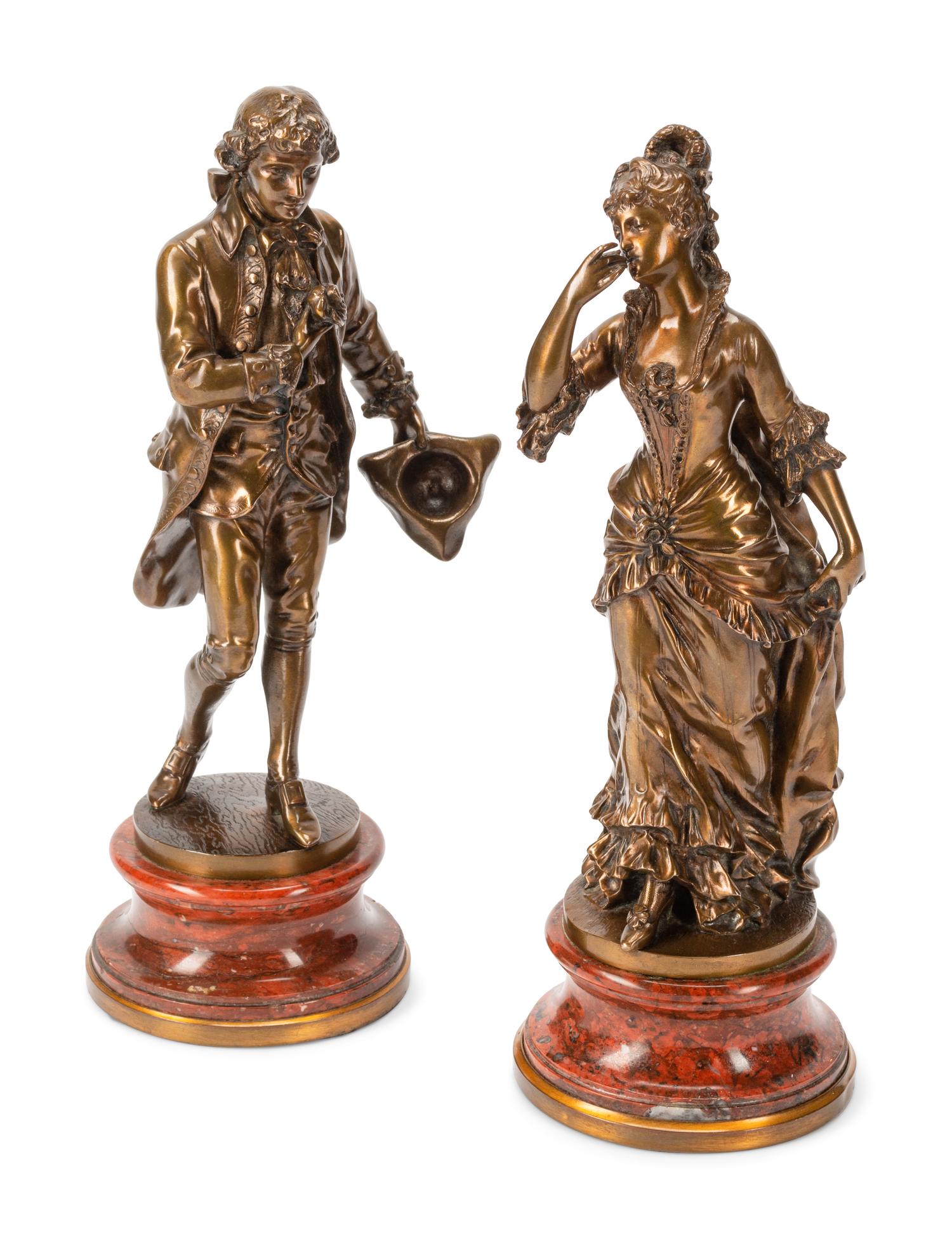 A Pair of French Gilt Bronze Figures on Rouge Marble Bases