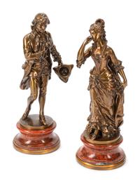 A Pair of French Gilt Bronze Figures on Rouge Marble Bases